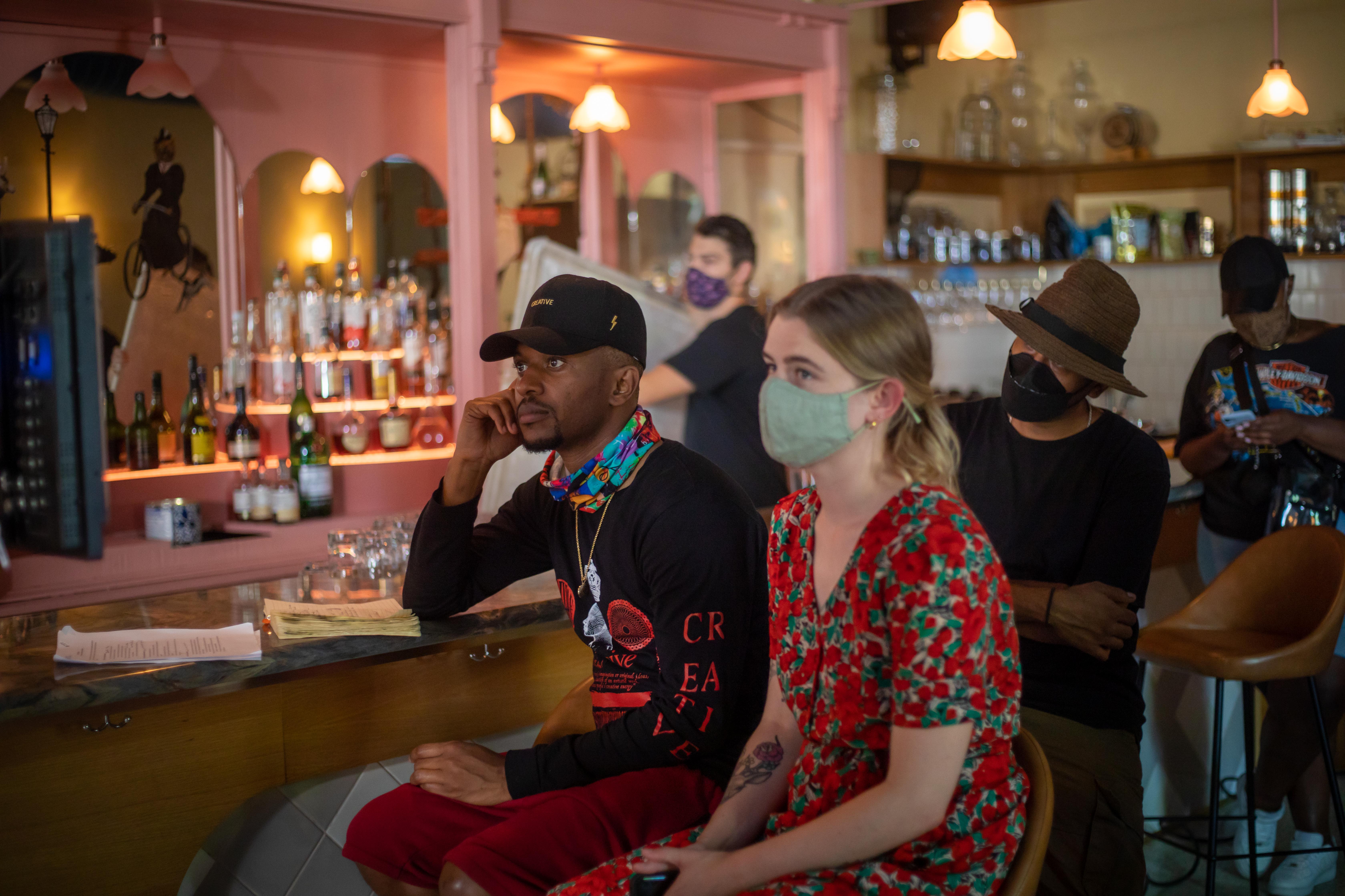 Corex Creative team reviewing footage at a partner location during the LCBO Spirit of Sustainability shoot