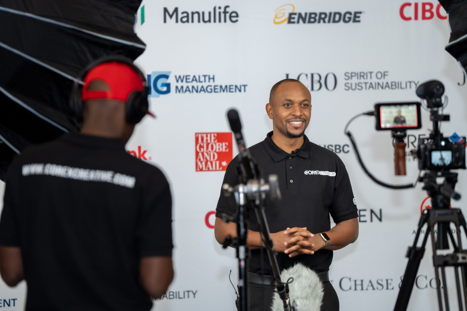 Setting up to shoot interviews at a conference with a small team. The first jobs that started to feel like real runway.